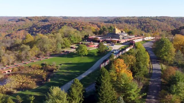Aerial view of Prabhupada&rsquo;s Palace of Gold at ISKCON New Vrindaban, West Virginia, surrounded by golden fall foliage and vibrant autumn colors at this famous Hindu temple landmark