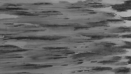 Black and white abstract texture featuring pronounced, horizontal paint stripes or brushstrokes. Tones range from dark charcoal gray and black to light gray highlights