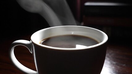 Artistic contrast used in chiaroscuro cinematic shot of coffee