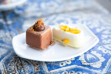 Delicate small cakes in sophisticated tasting environment