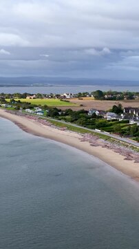 Aerial Flyover of Rosemarkie Seaside Village and Scottish Coastline
