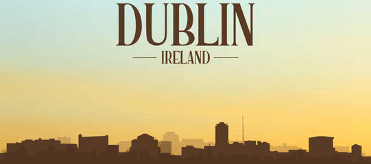 Panoramic poster of the city skyline with misty background buildings, hills sunrise, sunset and clouds of DUBLIN, IRELAND