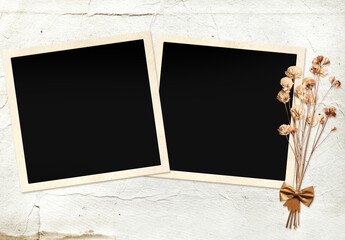 Vintage album page with retro photo frame. Retro background with old blank photo, dry pressed leaves and flowers on paper texture. Nostalgic scrapbooking style. Mock up template. Copy space for text