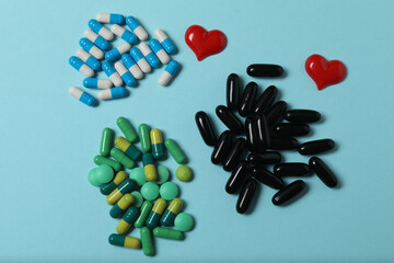 Pills in blister packs on a blue background
