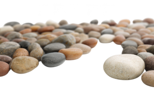 Smooth, rounded natural pebbles line up with some in sharp focus and others softly blurred