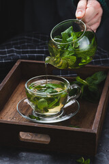 Mint tea in a glass mug