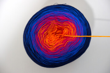 Top view of colorful cotton ball lying on gray desk. Photo taken November 20th, 2025, Zurich,...