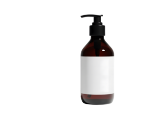Amber bottle with black pump and white label against a black background view