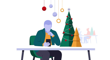 Person using smartphone with Christmas trees on the table.