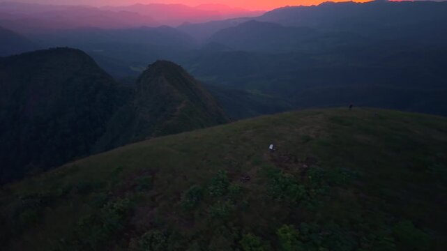 The light of the sunset on the mountain, the color of the evening sky, hiking