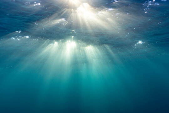 Sunbeams Piercing the Arctic Blue Depths