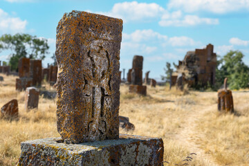 Ancient Khachkar Standing Amid the Ruins of Cemetery