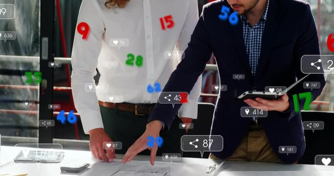 Right man tapping tablet, left man leaning over plans with floating metrics guiding design review