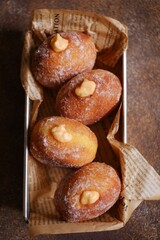 homemade bomboloni in a basket