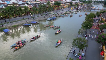 Fototapeta premium Asia, Vietnam , Hoi An, the city of lanterns, a UNESCO World Heritage Site . the traditional navigation with colored lanterns at night on the Thu Bon River - tourist attraction destination Vietnam 