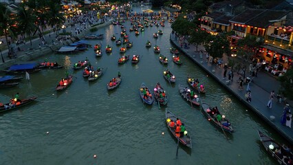 Asia, Vietnam , Hoi An, the city of lanterns, a UNESCO World Heritage Site . the traditional navigation with colored lanterns at night on the Thu Bon River - tourist attraction destination Vietnam  © andrea