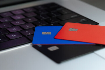 Credit cards on a keyboard. World bank system, online payments