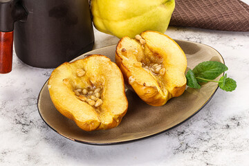 Baked quince with honey and cedar