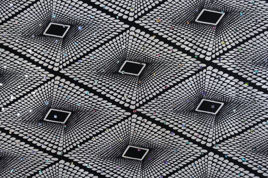 Background - black and white fabric with geometric pattern and sequins