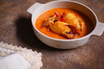 Padang style spicy curry squid in a bowl 