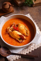 Padang style spicy curry squid in a bowl 