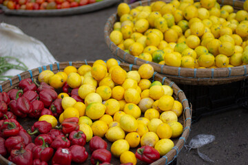 Colorful Citrus and Bell Peppers Display at Local Market