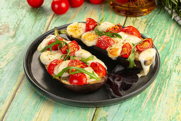 Baked eggplant with cherry and mozzarella