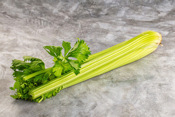 Raw green selery stem with leaves
