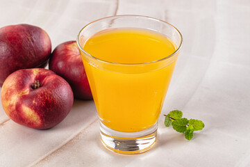 Vitamin beverage - peach juice glass
