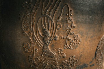 Carving on the Silla Bell in the temple of Seoul South Korea