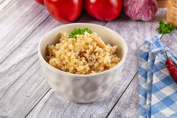 Vegan cuisine - boiled bulgur garnish