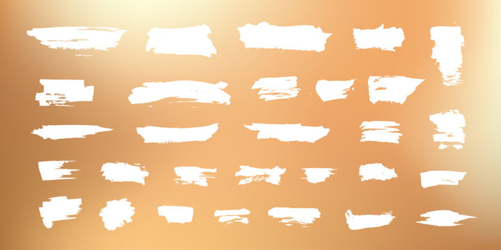 White grungy scratches collection isolated on golden background. Scribble textures for lottery scratch