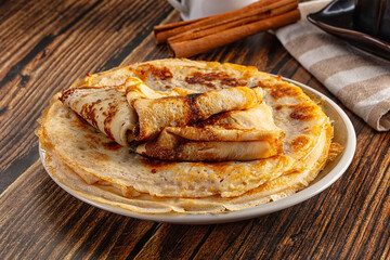 Thin homemade golden pancaces stack