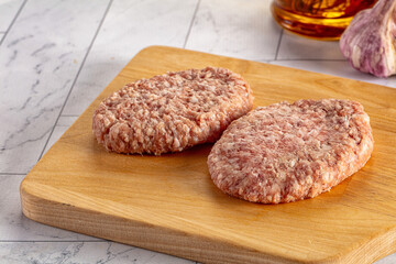 Raw minced meat cutlet for cooking