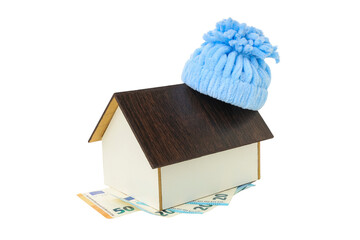A house in a blue hat symbolizes heating costs, isolated, PNG