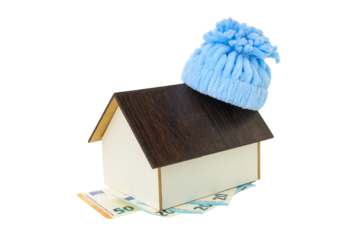 A house in a blue hat symbolizes heating costs, isolated, PNG
