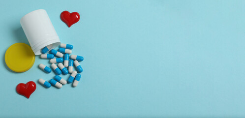 Pills in blister packs on a color background, banner
