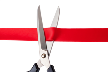 Scissors cutting vibrant red ribbon at grand opening ceremony, symbolizing new beginnings and business launch