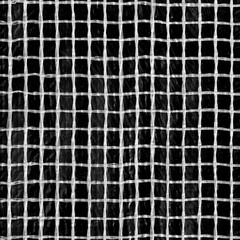 Fototapeta premium The texture of the mesh of white plastic threads
