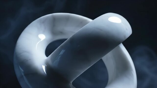 Glossy white mobius strip form with atmospheric mist