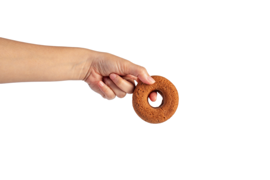 Chocolate round donut in hand on transparent background