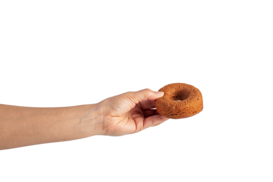 Chocolate round donut in hand on transparent background