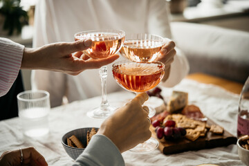 Glasses of rose wine seen during a dinner party of a celebration.