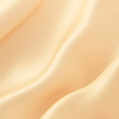 A close-up image shows light peach-colored fabric, possibly silk or satin, with soft, undulating folds that create a smooth, flowing texture. 