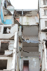 Ruins of a residential building destroyed during the war in Ukraine, severe damage caused by Russian invasion, aftermath of shelling in Chernihiv.