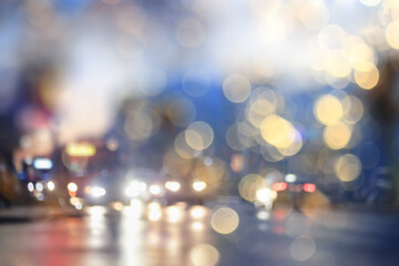 bokeh, blurred urban abstract background, glare on the street background, evening city © kichigin19