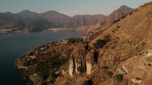 Aerial view of serene landscape with hills and mountains in lake atitlan during daytime.