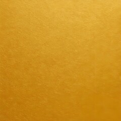 A close up shot of a solid gold colored background with a slightly textured surface and subtle gradients