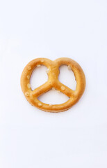 Salted pretzel on a white background. Isolate