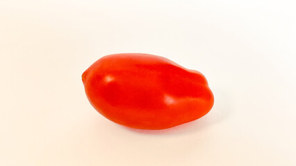 Red tomato on a white background. Isolate